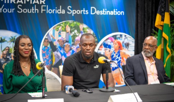 Press conference after the unveiling of the Usain Bolt statue at the Ansin Sports Complex.(L-R) Vice Mayor of Miramar, Alexandra P. Davis, Jamaican Olympic champion Usain Bolt, and Master sculptor Basil Watson.