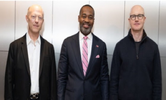 Premier David Burt (center) flanked by senior officials of Circle and Coinbase companies.