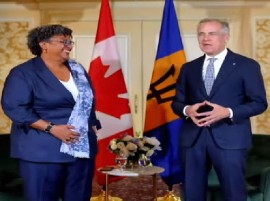 Prime Ministers Mia Mottley and Mark Caney (Photo courtesy Mottley’s Facebook)