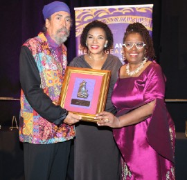 Jamaica’s Ambassador to the United States, Her Excellency Audrey Marks presents Mr. Stephen (Cat) Coore with the with the Caribbean-American Heritage Luminary Award at the 30th Caribbean-American Heritage Awards at the JW Marriott Hotel in Washington DC, on November 18, 2023. At Right is President of the Institute of Caribbean Studies, Dr. Claire Nelson. (Photo by Derrick Scott)