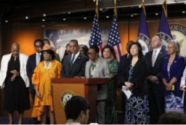 Congressional Black Caucus (CBC) Chair, Yvette D. Clarke, flanked by her colleagues speaking to the media.