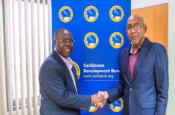CDB Vice-President (Operations), Dr. Isaac Solomon, joins Dominica’s Minister of Finance, Dr. Irving McIntyre, for a photo during the recent Country Portfolio Review and Country Engagement Strategy meetings.