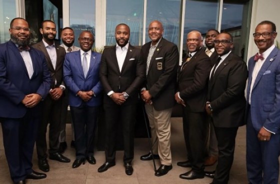 The Hon. I. Chester Cooper, Deputy Prime Minister and Minister of Tourism, Investments & Aviation (fourth from left) and members of Florida Federation of Alpha Chapters.
