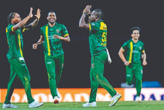 Jamaica Kingsmen captain Rovman Powell (second right) was full of praise for his troops after their loss to the Antigua & Barbuda Falcons in the CPL final.