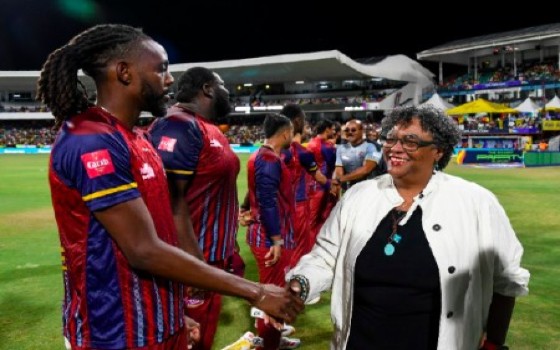 Barbados Prime Minister Mia Mottley greets Antigua & Barbuda Falcons player Shamar Springer ahead of the CPL final at Kensington Oval. Photo: CPL