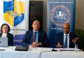 Executive Director of the Integrity Commission, Craig Beresford (right) addresses the a press conference during the 12th Annual Commonwealth Caribbean Association of Integrity Commissions and Anti-Corruption Bodies (CCAICAB) Conference. Also pictured are (from left) CCAICAB Chairperson Lady  Anande Trotman-Joseph and Director-General of the Major Organised Crime and Anti-Corruption Agency, Colonel Desmond Edwards. (Photo credit: JIS)