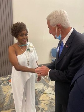 Charlie Crist joins Tangela Sears at the Parents of Murdered Children dinner in Miami. Sears is the founder of the Florida organization. Her son was killed in Tallahassee.