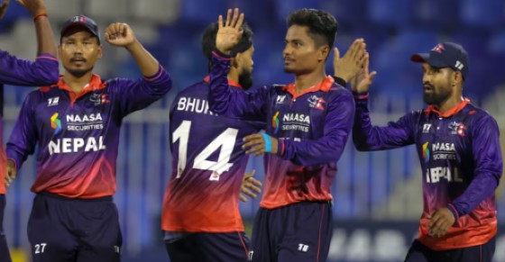 Nepal players celebrate the fall of another West Indies wicket