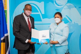 Guyana’s Minister of Education Priya Manickchand poses with Dr. Wayne Wesley, Registrar and CEO of CXC.