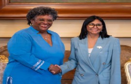 Barbados Prime Minister Mia Mottley (Left) and Venezuela’s Acting President Delcy Rpdriquez shake hands during their meeting in Caracas on Monday (Government of Barbados photo)