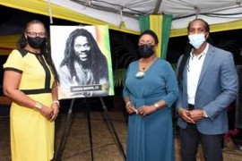 Minister of Culture, Gender, Entertainment and Sport, Hon. Olivia Grange, (centre); State Minister in the Ministry of Culture, Gender, Entertainment and Sport Hon. AlandoTerrelonge (right) share lens with Marjorie Leyden Kirton, Acting Executive Director of the Jamaica Cultural Development Commission. The event was held at Dennis Brown’s resting place in the National Heroes Park in Kingston on Monday, February 1.