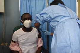 A man receives a dose of COVID-19 vaccine in July 2021. (Photo courtesy of PAHO)