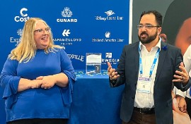Aquila Managing Partner Melanie Colpitts with Ed Limon, cofounder of Winged Whale Media, at Seatrade in Miami last month