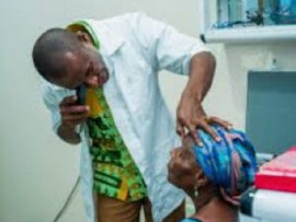 An elderly woman getting attention under the Jamaica-Cuba eye care programme (JIS Photo)