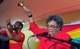 Barbados Prime Minister Mia Mottley ringing the bell on Saturday night signalling a snap general election for February 11.