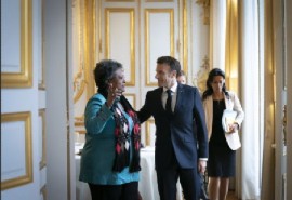French President Emanuel Macron greeting Barbados Prime Minister Mia Mottley in Paris on Friday (Photo courtesy PMO)