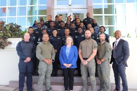 Canadian High Commission's Emina Tudakovic (centre) joins participants for a group photo at the completion ceremony of the Marine Border Integrity Course, organized by the Royal Canadian Mounted Police (RCMP) for members of the Jamaican Constabulary Force (JCF), alongside police representatives from Barbados and Guyana.