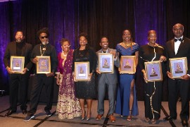 Caribbean American Heritage Awardees from Left: Ainsley Gill, Derrick 'Duckie’ Simpson, President of the Caribbean Institute Dr. Clare Nelson, Stacey Mollison, Dwight Smith, Josanne Francis, Professor Carol Davis and Biharil Lall, display their awards at the 29th Annual Caribbean American Heritage Awards Gala at the JW Marriott Hotel in Washington DC. (Photo by Derrick Scott)