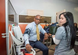 Dr. Gallon gets a blood pressure check.