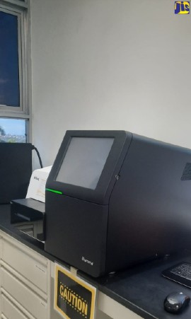 The new Genome Sequencer has significantly improved HIV transmission tracking on the island. (Photo credit: Twila Wheelan)