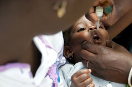 A young girl receives the polio vaccine in Nigeria. (Shryock/UNICEF)