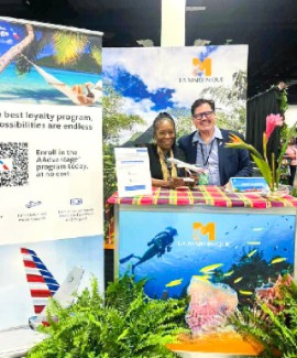 Muriel Wiltord with Glenn Heilbron at the Travel & Adventure Show in Fort Lauderdale