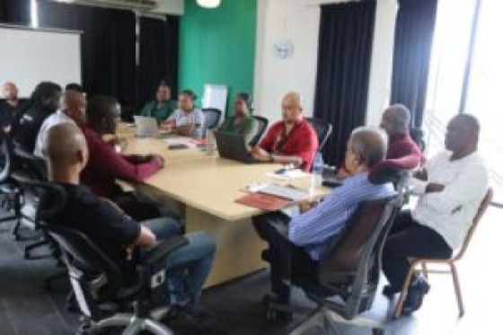Deputy minister of Health, Welfare and Labour, Raj Jadnanansing, meeting with officials of the union representing workers at Newmont Suriname,