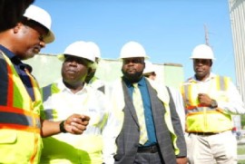 Prime Minister Philip Davis (second from left) listens as officials from the Bahamas Power and Light (BPL) explain the situation at the Blue Hills Power Station