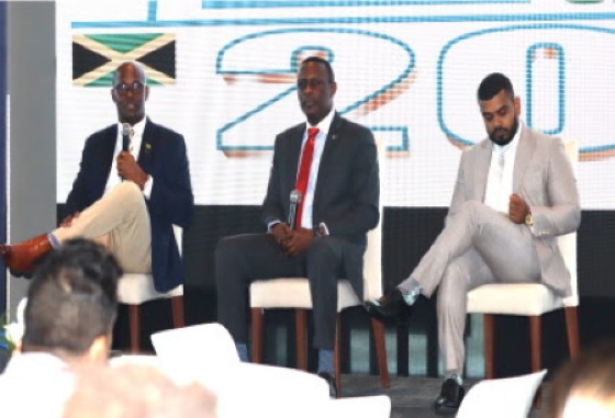 President of the GCCI, Kester Hutson (left) and GCCI executive member Richard Rambarran (right) participated in discussions at the conference (Photo: GCCI)