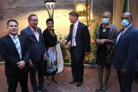 Jamaica’s Ambassador to the United States Her Excellency Audrey Marks greets the Assistant Secretary of State for the Caribbean, Mr. Mark Wells as he arrives at the Embassy of Jamaica to attend a reception marking the conclusion of consultations on ICT, cyber security, and energy between the governments of Jamaica and the United States on Friday at the Embassy of Jamaica in Washington DC.  On hand to greet the Assistant Secretary are Minister without Portfolio in the Ministry of National Security Senator Matthew Samuda; Delegation head, Science, Energy and Technology Minister Hon. Daryl Vaz; Education and Information Minister Hon. Faval Williams; and Minister without Portfolio in the Ministry of Economic Growth and Job Creation, Senator Aubyn Hill. (Derrick Scott Photo)