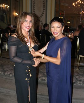 Jamaica’s Ambassador to the United States  Audrey Marks (right) congratulates Ambassador for Investment and Philanthropy, Mrs. Paula Kerr Jarret Wegman on receiving the prestigious Commonwealth Award from the St. George’s Society of  New York at its annual English Ball on Tuesday October  26, at the St. Pierre Hotel in Manhattan. Photo by Derrick Scott.
