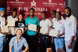 Participants of the seminar, Instructor, Joji Watanabe, Award-winning Mixologist (crouched at the front) and Chairman of the Grenada Tourism Authority, Randall Dolland (far right)
