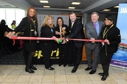 Francine Carter-Henry, Jamaica Tourist Board’s Manager, Tour Operators & Airlines (3rd left), joins John Kirby, VP of Network Planning, Spirit Airlines (3rd right) and Kerry Thompson, General Manager, Orlando International Airport (2nd left), in the ribbon cutting ceremony signaling the start of the airline’s nonstop service from Orlando International Airport (MCO) to Montego Bay’s Sangster International Airport (MBJ) on Thursday, February 28. Sharing the occasion is Phil Brown, CEO of Greater Orlando Aviation Authority (2nd right) and two Spirit Airlines in-flight crew members.  