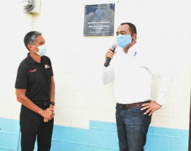 Minister of Health and Wellness, Dr. Christopher Tufton (right) and Benefactor of the National Supply Foundation, Nigel Chen See unveil the plaque to commemorate the adoption of the Ginger Hill Health Centre by the Foundation