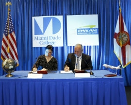 (l-r) Dr. Lenore P. Rodicio, Miami Dade College (MDC) Executive Vice President & Provost, and Mark Johnson, Executive Vice President and Chief Operating Officer of Pan Am International Flight Academy, signed an agreement Monday morning launching a partnership to create solid career paths for aviation students that will lead them to success in the dynamic aviation industry. The agreement addresses the critical shortage of commercial pilots expected within the next two decades, by training the future generation of top aviation professionals.