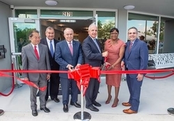 Chairwoman Audrey M. Edmonson and other officials cut the ribbon at the Three Round Towers elderly housing complex. (Photos by Armando Rodriguez / Miami-Dade County)