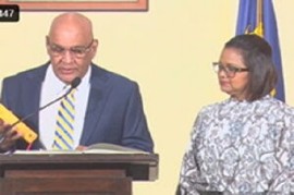 Satyakama “Kama” Maharaj, taking the oath of office before President Christine Kangaloo