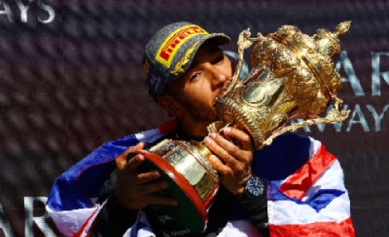 Lewis Hamilton celebrates his ninth capture of the British Grand Prix.