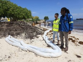 Energy Minister Senator Lisa Cummins (left) and Barbados National Energy Company Ltd. Group Health and Safety Manager Damien Catlyn inspecting the site. (Photo: Barbados Today)