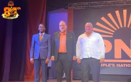 Grenada’s Prime Minister Dickon Mitchell (left) with PNP president and Opposition Leader, Mark Golding and former PNP leader Dr. Peter Phillips on Thursday night