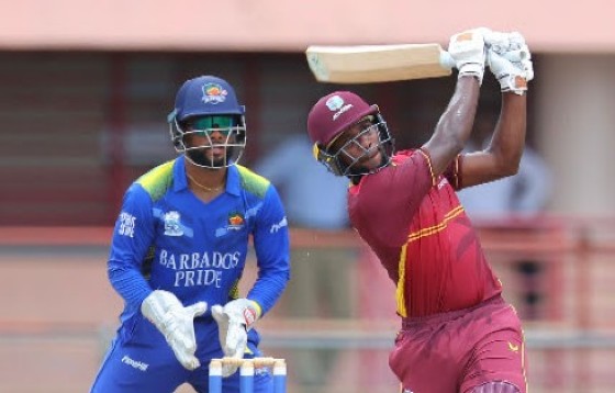 West Indies Academy captain Nyeem Young hits down the ground during his maiden List A half-century on Monday. (Photo courtesy CWI Media)