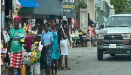 Haitians walking in the capital, Port au Prince (File Photo)