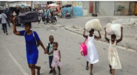 Thousands of families continue to flee their homes in Port-au-Prince due to gang-related violence. (UNICEF Photo)