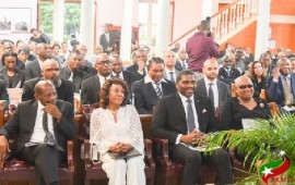 Prime Minister Dr. Terrence Drew along with US Congresswoman Maxine Waters. and Foreign Affairs Minister Dr. Denzil Douglas at the funeral service for Randall Robinson.