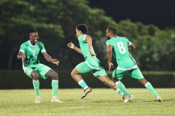 Dominic Richmond (centre) of hosts Montserrat celebrating with teammates Donervon Daniels (left) and Alex Dyer after scoring during the League B Group B match against Barbados at the Blakes Estate Stadium.(Photo courtesy Concacaf)