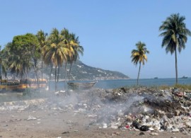 Rubbish burns on the coast of Haiti. (OHCHR/Marion Mondain Photo)