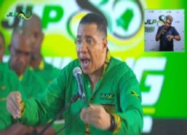Prime Minister Andrew Holness addressing the JLP convention on Sunday (CMC Photo)