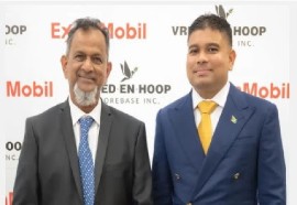 Azruddin Mohamed (right) and his billionaire businessman father, Nazar “Shell” Mohamed (File Photo)