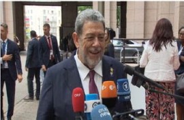 St. Vincent and the Grenadines Prime Minister Dr. Ralph Gonsalves fielding questions from reporters outside the venue for the EU-CEL:AC summit in brussels (CMC Photo)