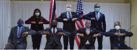 National Security Minister Fitzgerald Hinds (second from left front row) flanked by Chargé d’Affaires Shante Moore, USAID representative Clinton D. White and other US and Trinidad and Tobago officials (File Photo)